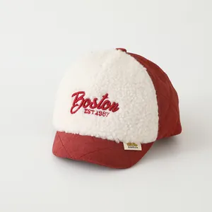 Winter kids Boston baseball cap with white fleece front and red quilted brim for boys
