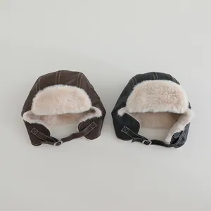 Winter faux leather aviator hat with plush lining and ear flaps for kids, brown and black
