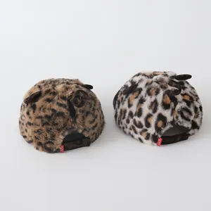 Detailed view of plush leopard print baby baseball caps with cute decorative loops