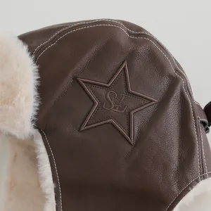 Brown leather aviator hat with faux shearling lining and embroidered star detail