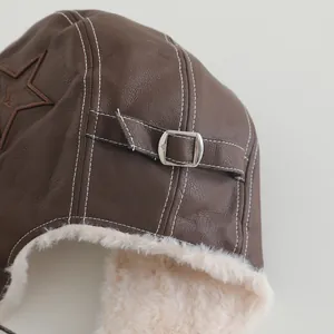 Kids warm pilot aviator hat in dark brown leather with white fleece lining and star patch