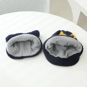 Winter knit hat and scarf set for kids with warm fleece lining and star pattern