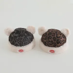 Leopard print plush baby winter hats with twin pom-poms and soft faux fur trim