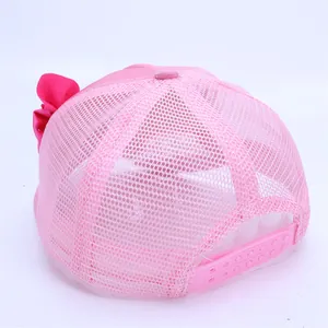 Gorra de sol para niña pequeña con malla transpirable y detalle de lazo rosa en el lateral