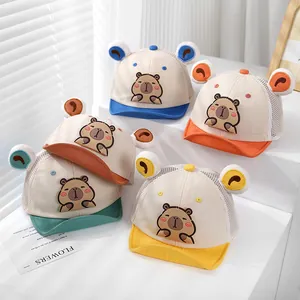 Detail of breathable mesh summer baby caps with cute capybara print and soft brims