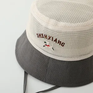 Kids breathable mesh bucket hat with puppy embroidery and chin strap for sun protection