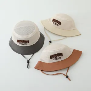 Detailed view of breathable mesh toddler sun hats with Brooklyn New York embroidery