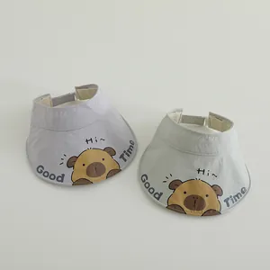 Detail of adjustable breathable sun visors with cute capybara and wide brim for kids