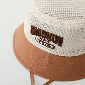 Kids breathable mesh bucket hat with Brooklyn embroidery and sun protection strap