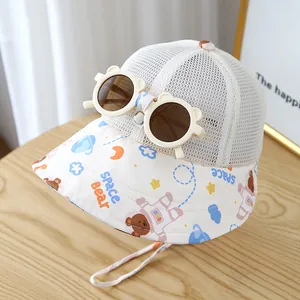 Detail of space bear sun hat with mesh panels, cartoon star prints and bear ear lenses