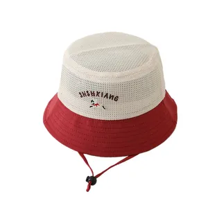 Kids breathable mesh bucket hat with puppy print and adjustable chin strap in white and red