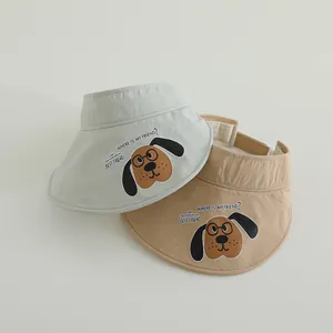 Detail of adjustable quick-dry kids sun hats with cartoon dog pattern and text design