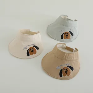 Detail of adjustable velcro strap on kids sun hats with cute cartoon character print