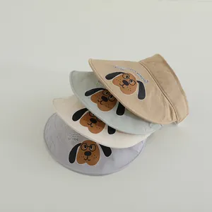 Detail of four quick-dry sun visors for kids in khaki, beige, green, and gray shades