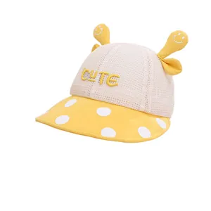 Cute yellow breathable mesh sun hat for kids with polka dots and 3D cartoon tentacles