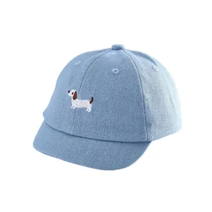 Light blue denim baseball cap for toddlers featuring a cute dachshund puppy embroidery