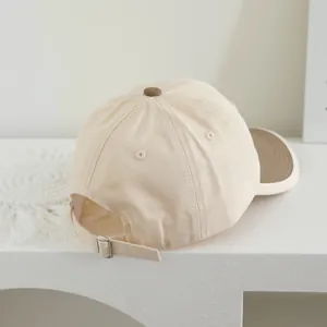 Kids baseball cap in beige and brown contrast colors with adjustable metal slide buckle