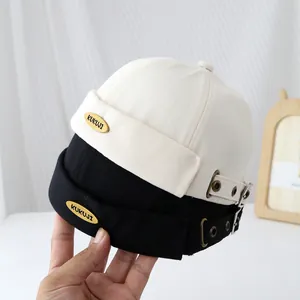 Berretto vintage stile docker per bambini in nero e beige con logo KUKUJI