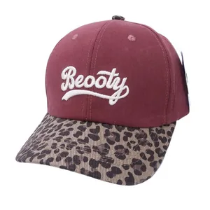 Kids baseball cap featuring burgundy crown with leopard print brim and Beooty embroidery