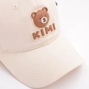 Off-white kids baseball cap with 3D teddy bear patch and KIMI text on canvas