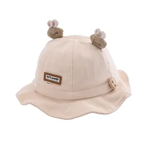 Cute beige corduroy rabbit ear sun hat for babies with embroidered love and outlawed patch