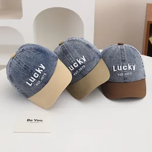 Three retro color-blocked denim baseball caps for kids with Lucky embroidery