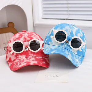 Kids baseball cap with tie-dye patterns and creative decorative sunglasses on the front