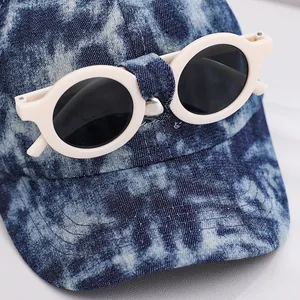 Kids tie-dye baseball cap with decorative sunglasses in snowflake wash denim blue
