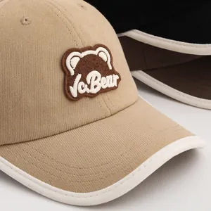 Detail of cartoon bear patch embroidery and premium cotton texture on kids baseball cap