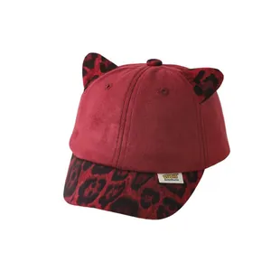 Kids' burgundy baseball cap with leopard print ears and warm suede texture for autumn