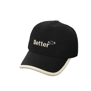Kids black corduroy baseball cap with Better embroidery and cream brim trim