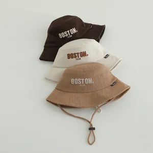 Three corduroy fisherman hats for kids with BOSTON embroidery and adjustable chin straps