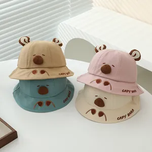 Detailed view of kids cute cotton sun hats with capybara 3D ears in various colors