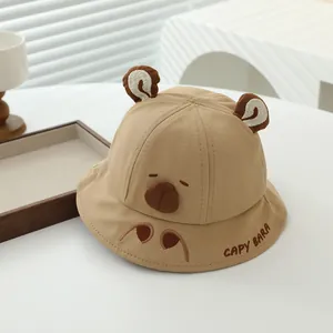 Detailed embroidery of Capy Bara text and cute animal ears on beige cotton sun hat