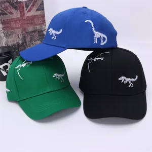 Detailed embroidery of dinosaur skeletons on cotton twill baseball caps for kids