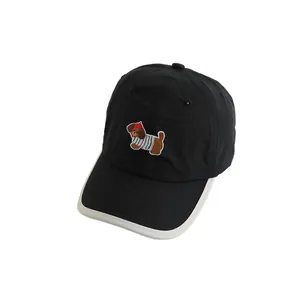 Breathable black kids baseball cap with cartoon puppy embroidery and white trim