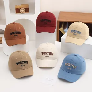 Detail of six baseball cap colors featuring BOSTON 3D embroidery and twill cotton texture