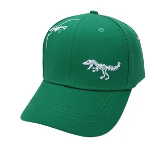 Kids forest green cotton baseball cap with white dinosaur skeleton embroidery
