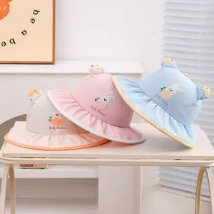 Three kids sun hats with rabbit embroidery and candy-colored ears in pastel tones