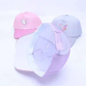 Kids baseball cap with sequin heart patch and glitter fabric in pink, purple and silver