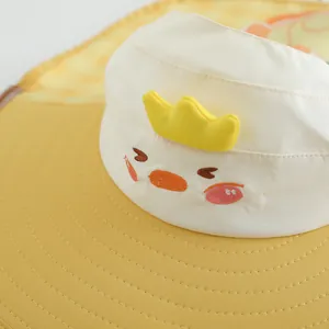 Chapeau de soleil enfant à large bord avec motif poussin jaune et couronne 3D