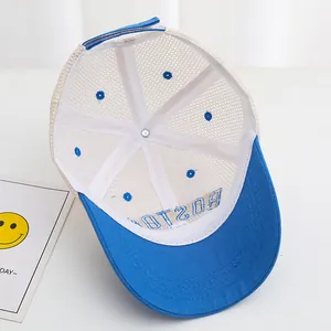Detail view of the breathable mesh design and adjustable strap on the blue trucker hat