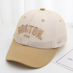 Detail of BOSTON 1836 3D embroidery on beige and khaki mesh trucker cap for kids