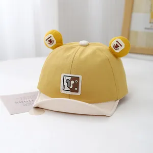 Baby mustard yellow soft-brim baseball cap with cute ears and cartoon bear patch