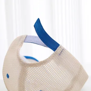 Detail of breathable mesh baseball cap with blue adjustable velcro strap for kids