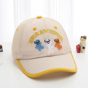 Detail of breathable mesh fabric on kids' sun hat with cute bear embroidery