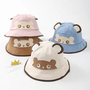 Detailed collection of toddler sun hats with cute bear embroidery in pastel colors