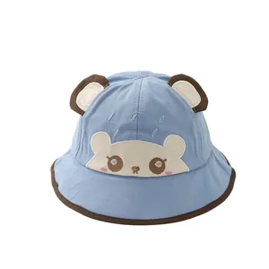 Blue cartoon bear baby bucket hat for sun protection with cute ears and brown trim