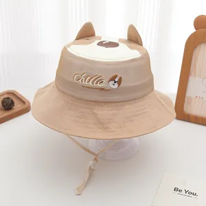 Detail of cartoon dog bucket hat with 3D ears and breathable side mesh for kids