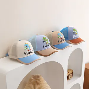 Mesh detail on kids baseball caps with cute dinosaur patches and Hello embroidery